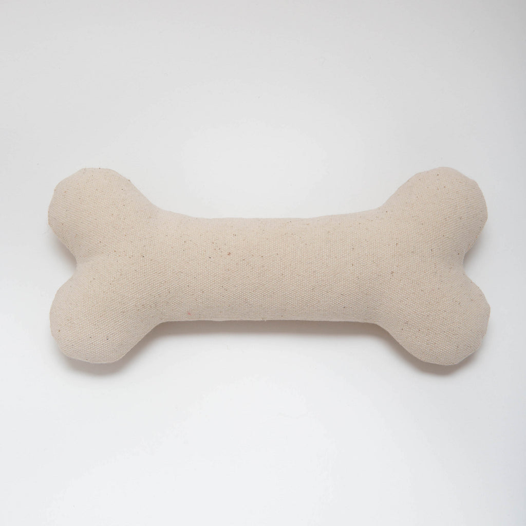 Back view of Mongrel London's canvas dog bone in natural colour
